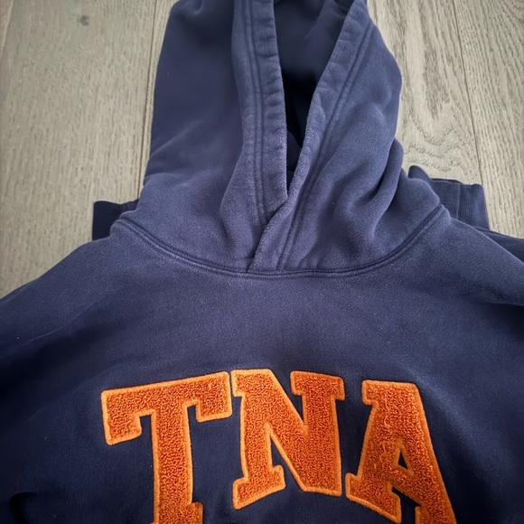 TNA Dark Blue Pullover with Vibrant Orange Emblem - Picture 2 of 4